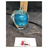 Vintage glass apple paperweight with blue core