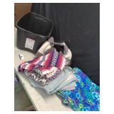 Tote of throw blankets
