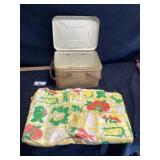 Vintage picnic basket with tablecloth