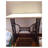 Cast iron singer stand with stoneware top