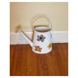 Painted watering can