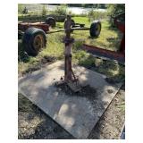 Tire changer on metal platform