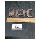 Cast iron welcome sign