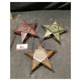 3 star shaped hanging candle holders with