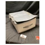 Storage container with mothballs approximately 1