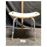 Adjustable shower seat
