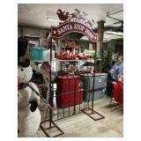 Metal Santa stop here trellis approximately 8