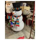 Lighted snowman approximately 6 feet tall
