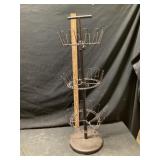 Revolving shoe rack, approximately 36 inches tall