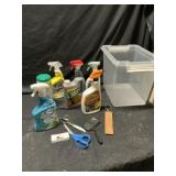 Clear tote of cleaning supplies