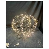 2 lighted hanging spheres, 16 inches across