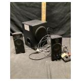 2 computer speakers and base speaker