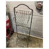 Metal basket stand approximately 46 inches tall