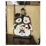 Wooden snowman decor, approximately 36 inches tall