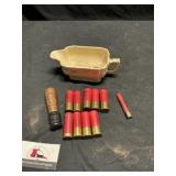 Wooden duck call with 20 gauge shotgun shells