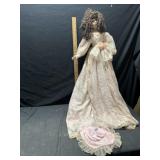 Porcelain doll approximately 38 inches