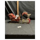 Christmas decor, metal sleigh, and reindeer