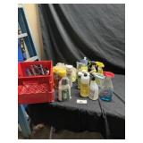 Milk crate of cleaning supplies