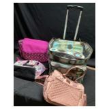 Bag on wheels with other purses