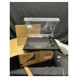 Denon turntable turns on