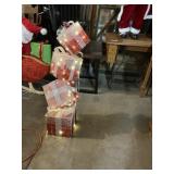 Lighted Christmas presents approximately 3 feet