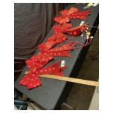 4 lighted red ribbons 24 inches long