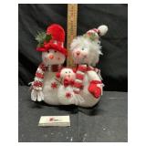 Snowman sandbags approximately 12 inches tall
