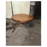 Walnut Eastlake oval table approximately 27 x 36