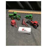 John Deere and international toy tractors