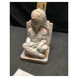 Marble style Native American statue