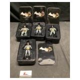 75 years of Batman characters in tins