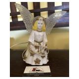 Vintage illuminated angel tree topper