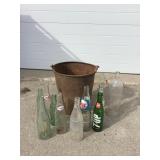 Pail of Glass Bottles