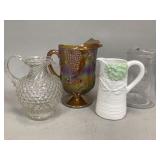 Four Decorative Pitchers