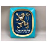 Lï¿½wenbrï¿½u Sign