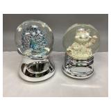 Two Musical Snow Globes