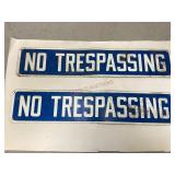 Two Metal 'No Trespassing' Signs