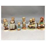 Assorted M.I. Hummel Figurine Collectibles