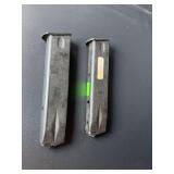 2 metal mags marked MAG-RUG20