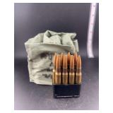 .30 CAL 48 cartridges in a bandolier