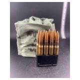 .30 CAL 48 cartridges in a bandolier