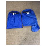 Rock climbing equipment in an REI Stuff Sack.Includes harness, rope, carabiners, and more.