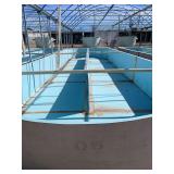 Used oval fiberglass aquaculture tank. Approximately 55’x16’x4’. Comes with two tank filtration system and center partition.