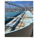 Used oval fiberglass aquaculture tank. Approximately 55’x16’x4’. Comes with two tank filtration system and center partition.