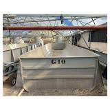 Used rectangular fiberglass aquaculture tank, approximately 40’ x 9.5’ x 4’, with 2-tank filtration system.