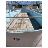 Used oval fiberglass aquaculture tank. Approximately 55’x16’x4’. Comes with two tank filtration system and center partition.