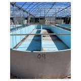 Used oval fiberglass aquaculture tank. Approximately 55’x16’x4’. Comes with two tank filtration system and center partition.