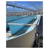 Used oval fiberglass aquaculture tank. Approximately 55’x16’x4’. Comes with two tank filtration system and center partition.