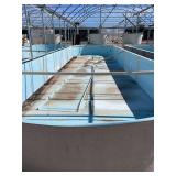 Used oval fiberglass aquaculture tank. Approximately 55’x16’x4’. Comes with two tank filtration system and center partition.