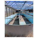 Used oval fiberglass aquaculture tank. Approximately 55’x16’x4’. Comes with two tank filtration system and center partition.